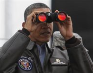 Obama scans tense Korean DMZ, North mourns Kim Jong-il
