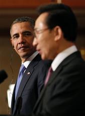 Obama urges N. Korea to "pursue peace"