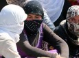 داعش زنان ایزدی را برهنه به مزایده می گذارد