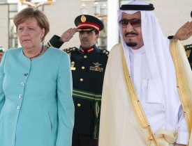 Merkel meets Saudi King without hijab, talks business, not women’s rights