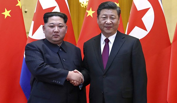 North Korea Confirms Kim Jong Un, Wife Visit China
