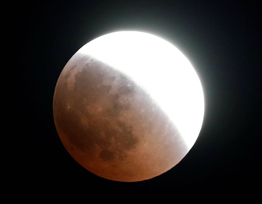 Blood Moon dazzles star gazers in longest lunar eclipse of century