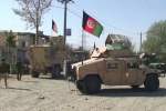 Afghan forces use artillery to repel multiple Taliban assaults that kill at least 21