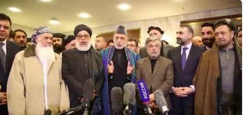 Former President Hamid Karzai tells reporters that they had a fruitful meeting as they wrapped up the first day of talks in Moscow