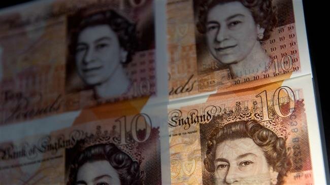 Pound falls after UK parliament rejects Brexit plan