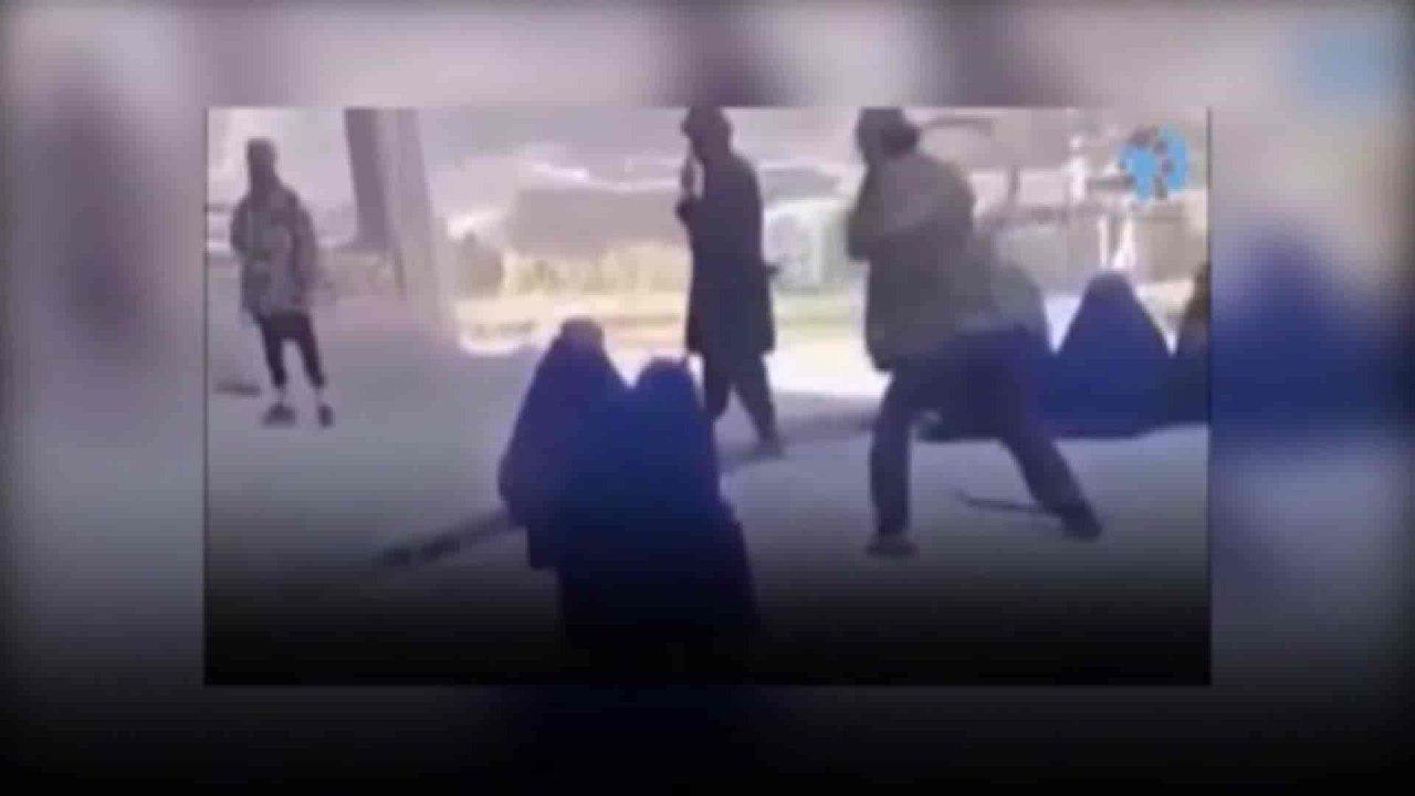 Taliban lash two girls wearing men