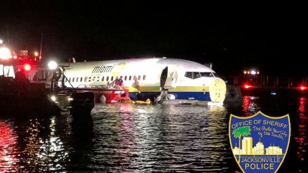 Woman aboard a plane that skidded into a river says the landing 