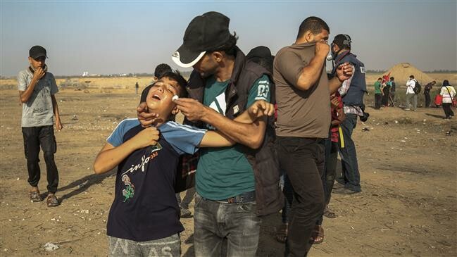 Zionist troops attack Palestinian protesters at Gaza border, 70 injured
