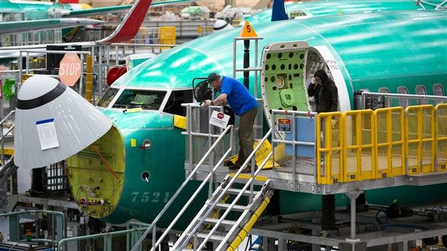 Boeing reports biggest-ever loss as 737 MAX grounding drags on