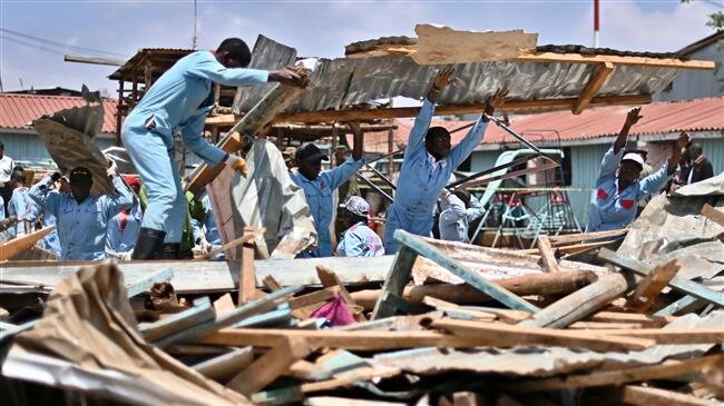 Seven children killed, scores hurt in school collapse