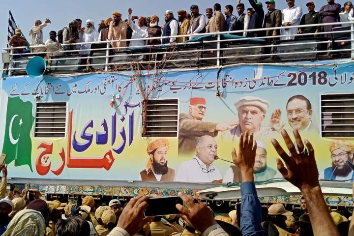 Pakistani marchers head for Islamabad in challenge to Imran Khan