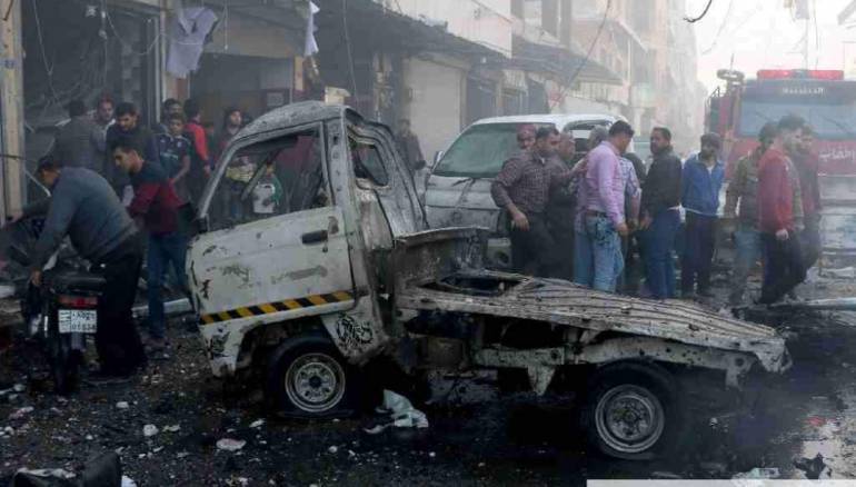 Deadly car bomb blasts rip through bus terminal in al-Bab town, 18 killed