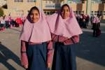 Afghan children learn side by side with Iranian peers