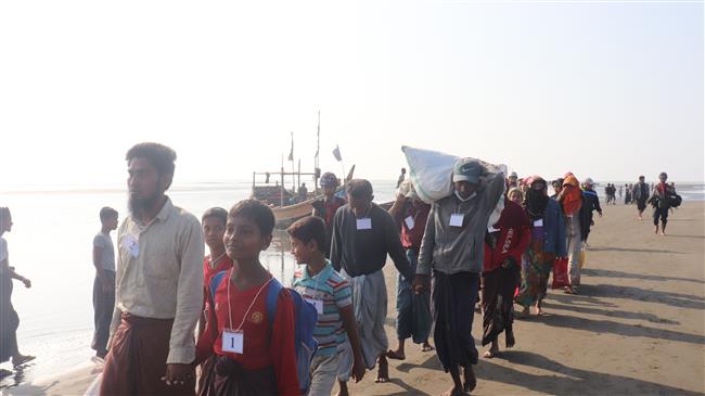 Myanmar sends 200 Rohingya Muslims captured at sea to camps in Rakhine