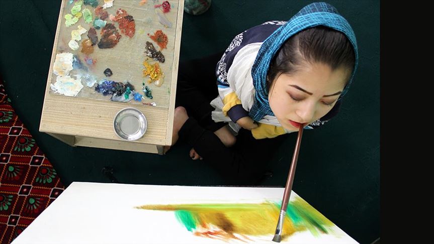 Disabled Afghan girl makes living by selling paintings