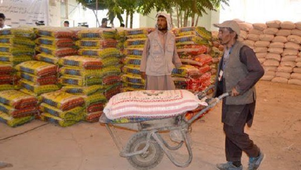 COVID-19: Food Items Distributed in Afghans’ Camp Provided By China