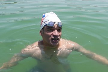 Afghan Olympic Swimmer Amid COVID-19 Trains in Lake