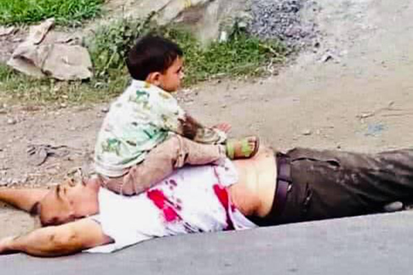 Anger in India-held Kashmir After Picture of Child Next to Body Goes Viral