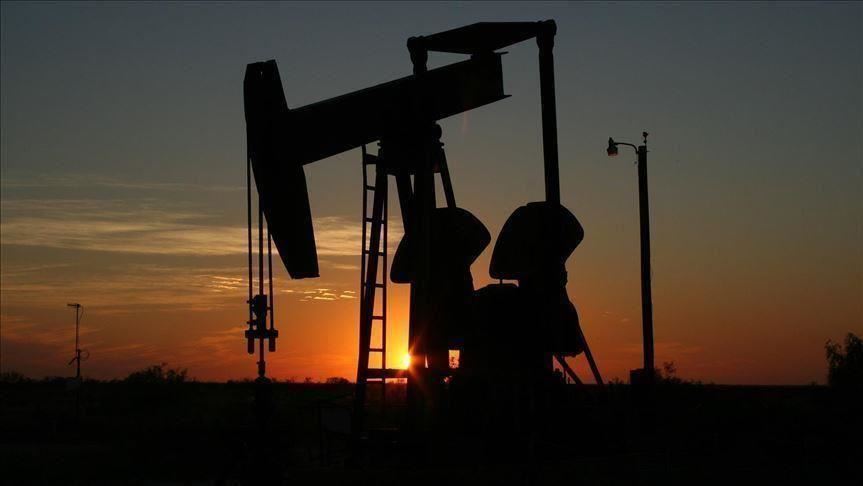 Oil prices down with record new virus cases in US state
