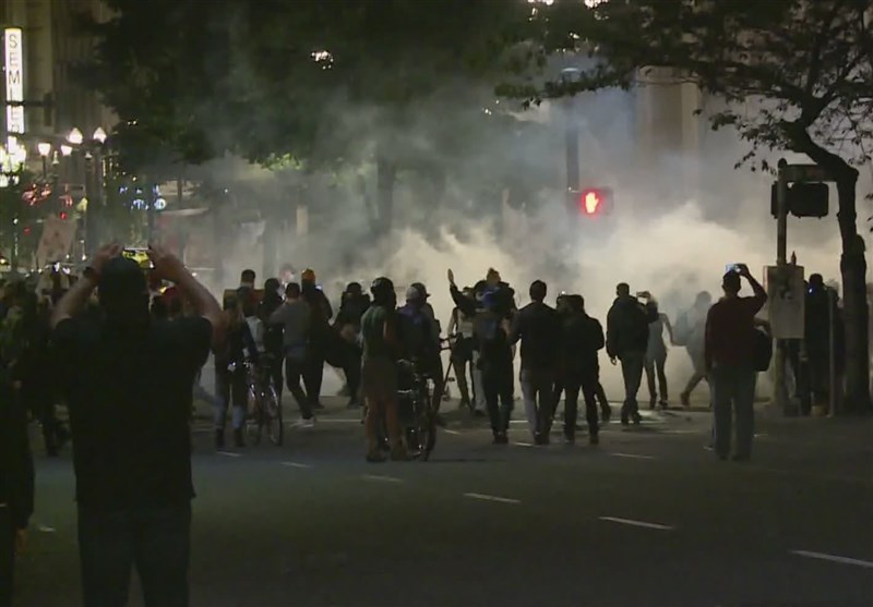 Portland Black Lives Matter protesters clash with armed federal agents