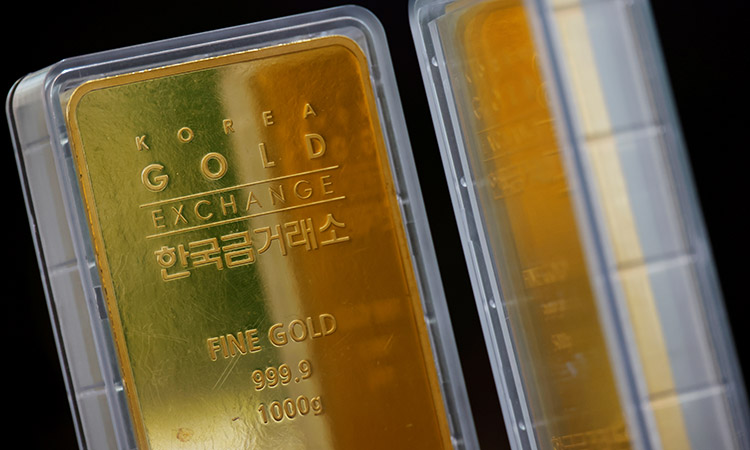 Gold rises to two-week high as dollar stumbles
