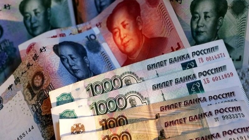 استفاده از ارز داخلی به جای دالر و یورو در معاملات چین و روسیه