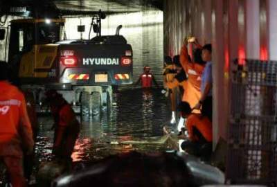 Retrieve 8 bodies from flooded South Korea underpass