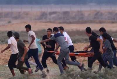 Israeli Forces Injure over 30 Palestinian Protesters in Gaza Clash