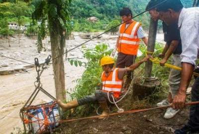 Indian flood death toll up to 77 as waters recede