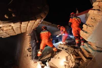 China earthquake: death toll rises to 131 as freezing weather hinders rescue efforts