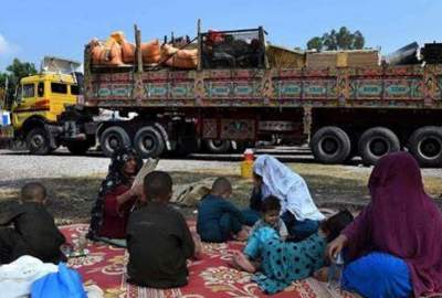 The return of about 500 Afghan refugees, including 74 prisoners released from Pakistan